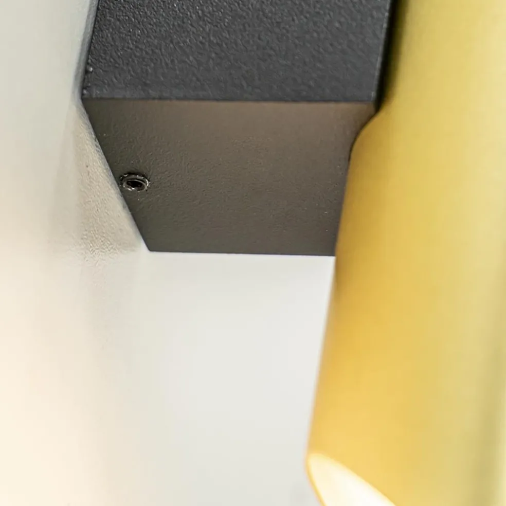 Chique wandlamp solid brass met zwart up+down