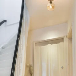 Plafondlamp toilet goud met amber glas